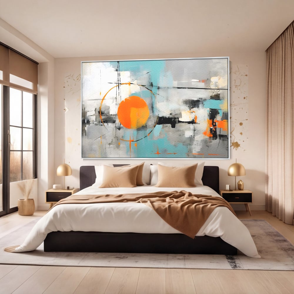 Tablou canvas cu pictura abstracta cu cerc portocaliu, in rama de aluminiu argintiu, pe perete intr-un dormitor